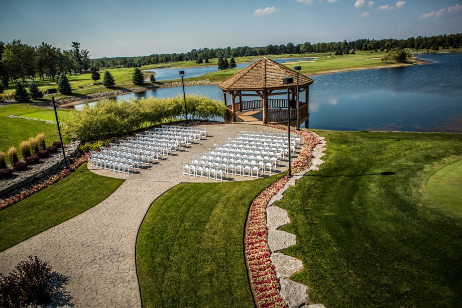Waterfront outdoor wedding ceremony setup at Solitude Links