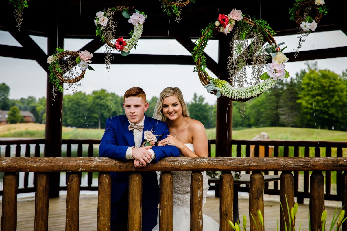 Bride and groom portrait inside the Solitude Links gazebo